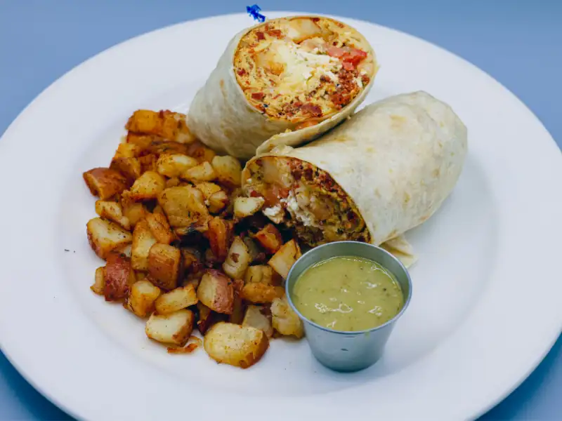 Scrambled eggs, ham, bacon, sausage & cheddar cheese. Served with country potatoes.