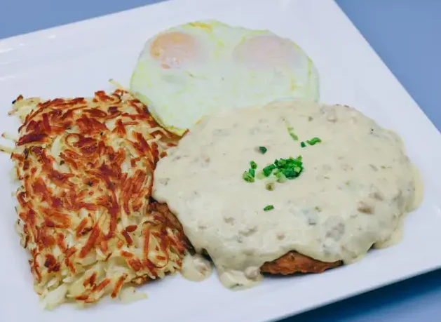 Two eggs served with hashbrowns and fried steak. Fried steak topped with house-made gravy.