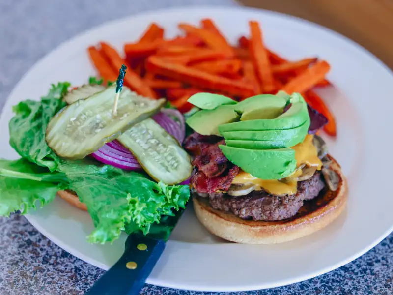 Sliced avocado, sautéed mushrooms, bacon & Monterey jack cheese on a patty. Served with sweet potato fries.
